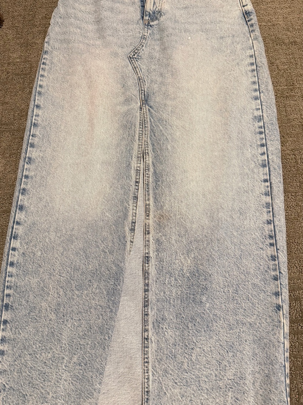 Zara Light Wash denim skirt with front slit. Raw edge hem
